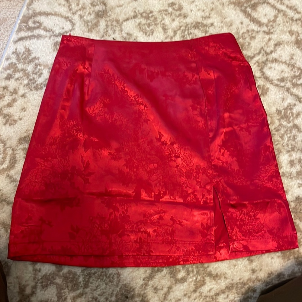Red satin silk mini skirt with front slit